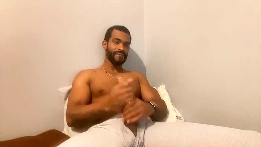 Handsome bearded guy double-fists himself over the edge