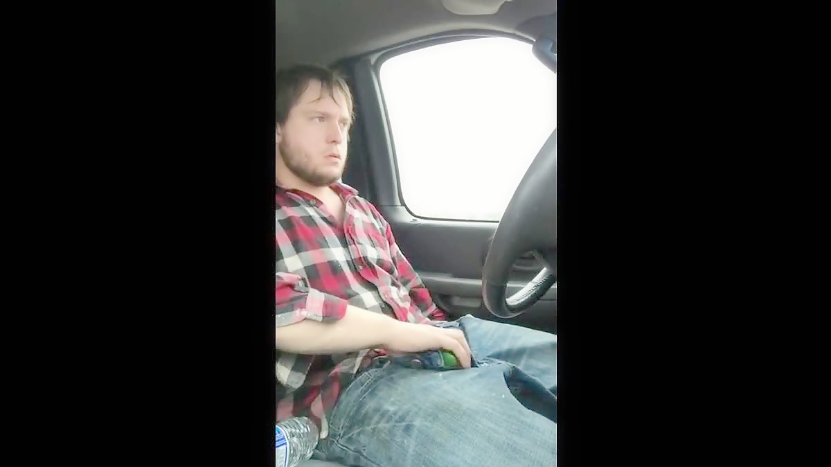 Stroking my big cock while driving